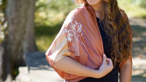close up of model wearing kimono shrug